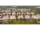 Wide aerial view shows home's location in community at 7561 Pesaro Dr, Sarasota, FL 34238