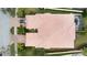Top-down view of house, driveway, and landscaping at 7561 Pesaro Dr, Sarasota, FL 34238