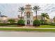 Community clubhouse with clock tower at 7561 Pesaro Dr, Sarasota, FL 34238