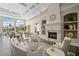 Elegant community room boasts fireplace, seating area, and large windows at 7561 Pesaro Dr, Sarasota, FL 34238