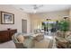 Relaxing Gathering room with sliding doors opening to the outdoors at 7561 Pesaro Dr, Sarasota, FL 34238