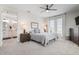 Spacious bedroom with a king-size bed, and access to a private balcony at 7611 34Th W Ave # 201, Bradenton, FL 34209