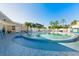 Relaxing circular pool with surrounding lounge chairs at 808 53Rd E Ave # 226L, Bradenton, FL 34203