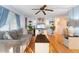 Living room with gray couch, coffee table, and hardwood floors at 808 53Rd E Ave # 226L, Bradenton, FL 34203