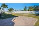 Large brick paved patio area in backyard at 808 53Rd E Ave # 226L, Bradenton, FL 34203