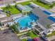 Community pool with surrounding lounge area at 808 53Rd E Ave # 226L, Bradenton, FL 34203