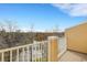 Spacious balcony overlooks a tranquil lake and treetops at 8908 White Sage Loop, Lakewood Ranch, FL 34202