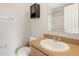Bathroom includes a shower, toilet, and vanity at 8908 White Sage Loop, Lakewood Ranch, FL 34202