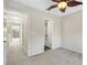 Bedroom with private bath and access to hallway at 8908 White Sage Loop, Lakewood Ranch, FL 34202