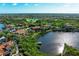Community overview showcasing a lakefront location and lush greenery at 9711 Sea Turtle Ter # 102, Bradenton, FL 34212