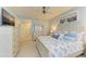 Main bedroom with king-size bed and dresser at 9711 Sea Turtle Ter # 102, Bradenton, FL 34212