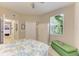 Guest bedroom with double bed and built-in wardrobe at 9711 Sea Turtle Ter # 102, Bradenton, FL 34212