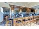 Community bar with granite counter and high top seating at 9711 Sea Turtle Ter # 102, Bradenton, FL 34212