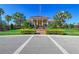 Beautiful community clubhouse with landscaping at 9711 Sea Turtle Ter # 102, Bradenton, FL 34212