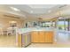 Elegant kitchen with stainless steel appliances and a large island at 9711 Sea Turtle Ter # 102, Bradenton, FL 34212