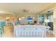 Spacious living room with comfortable seating and beautiful views at 9711 Sea Turtle Ter # 102, Bradenton, FL 34212