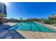 Inviting resort-style pool with lounge chairs at 9711 Sea Turtle Ter # 102, Bradenton, FL 34212