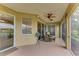 Peaceful screened porch with wicker seating at 9711 Sea Turtle Ter # 102, Bradenton, FL 34212