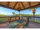 Gazebo with scenic waterfront views and picnic table at 9711 Sea Turtle Ter # 102, Bradenton, FL 34212