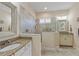 Elegant bathroom with granite vanity and walk-in shower at 9765 Highland Park Pl, Palmetto, FL 34221