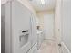 Laundry room with washer, dryer and refrigerator at 9765 Highland Park Pl, Palmetto, FL 34221