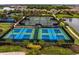 Aerial view of tennis and pickleball courts at 9765 Highland Park Pl, Palmetto, FL 34221