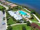 Aerial view of community pool, clubhouse and playground at 1030 Tidewater Shores Loop # 306, Bradenton, FL 34208