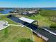 Private boat lift with covered dock providing convenient water access at 1030 Tidewater Shores Loop # 306, Bradenton, FL 34208