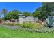 Landscaped entrance to the community with a welcoming sign at 1030 Tidewater Shores Loop # 306, Bradenton, FL 34208