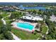 Resort-style pool with lounge chairs and a large sundeck at 1030 Tidewater Shores Loop # 306, Bradenton, FL 34208
