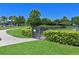 Fenced dog park with a walking path nearby at 1030 Tidewater Shores Loop # 306, Bradenton, FL 34208