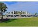 Luxury condo building, featuring covered parking and waterfront views at 1030 Tidewater Shores Loop # 306, Bradenton, FL 34208