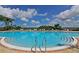 Inviting community pool with ample lounge space at 1030 Tidewater Shores Loop # 306, Bradenton, FL 34208