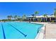 Large community pool with plenty of seating at 1030 Tidewater Shores Loop # 306, Bradenton, FL 34208