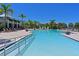 Relaxing community pool with easy access and lounge area at 1030 Tidewater Shores Loop # 306, Bradenton, FL 34208