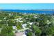 Aerial perspective of a residential area, highlighting a single-story house and neighborhood context at 104 24Th Ne St, Bradenton, FL 34208