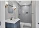 Modern bathroom with gray tile and updated vanity at 104 24Th Ne St, Bradenton, FL 34208