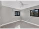 Bright bedroom with ceiling fan and carpet at 104 24Th Ne St, Bradenton, FL 34208