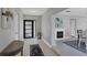 Open entryway featuring a console table and view into living area at 104 24Th Ne St, Bradenton, FL 34208
