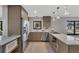 Updated kitchen featuring stainless steel appliances and stylish cabinetry at 104 24Th Ne St, Bradenton, FL 34208