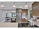Modern kitchen featuring stainless steel appliances and white countertops at 104 24Th Ne St, Bradenton, FL 34208