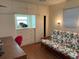 Bedroom with a futon, dresser, and desk at 1111 42Nd E Ave, Ellenton, FL 34222