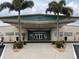 Tidevine Estates community entrance with covered walkway and landscaping at 1111 42Nd E Ave, Ellenton, FL 34222