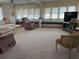 Spacious living room featuring ample natural light and comfortable seating at 1111 42Nd E Ave, Ellenton, FL 34222
