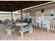 Community pool area with tables and chairs at 1111 42Nd E Ave, Ellenton, FL 34222