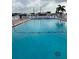 Community swimming pool with lounge chairs at 1111 42Nd E Ave, Ellenton, FL 34222