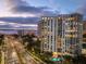 Stunning high-rise building with a swimming pool and views of the water at 1111 N Gulfstream Ave # 4E, Sarasota, FL 34236