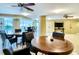 Spacious community game room with multiple tables and chairs for socializing at 1111 N Gulfstream Ave # 4E, Sarasota, FL 34236