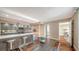 Beautiful kitchen open to dining room with seating at the large island and stainless steel appliances at 1111 N Gulfstream Ave # 4E, Sarasota, FL 34236