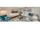 Stylish living room with modern furnishings and hardwood floors at 1111 N Gulfstream Ave # 4E, Sarasota, FL 34236